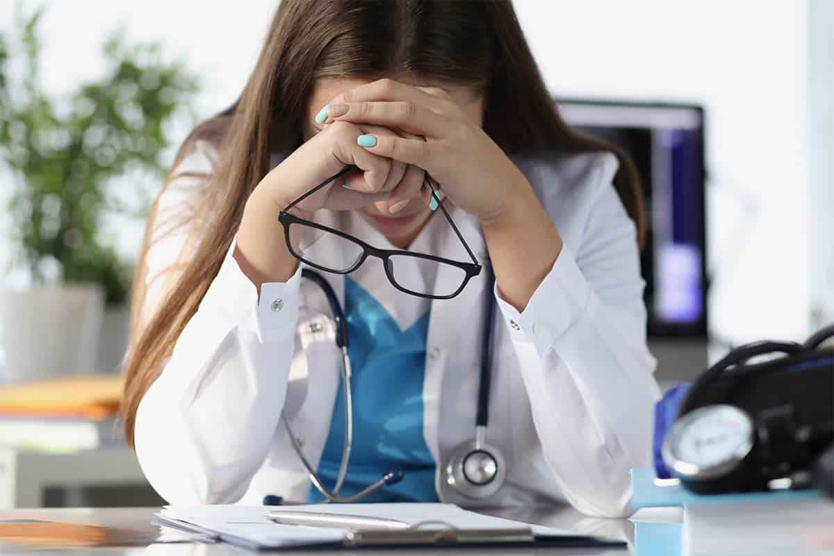 Unburdening Doctors: The Role of Remote Virtual Admins in Preventing Burnout